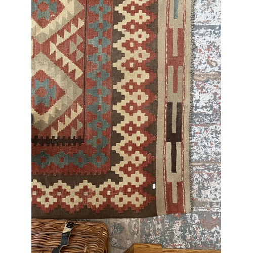 156 - A mid 20th century Kilim rug - approx. 227cm x 166cm