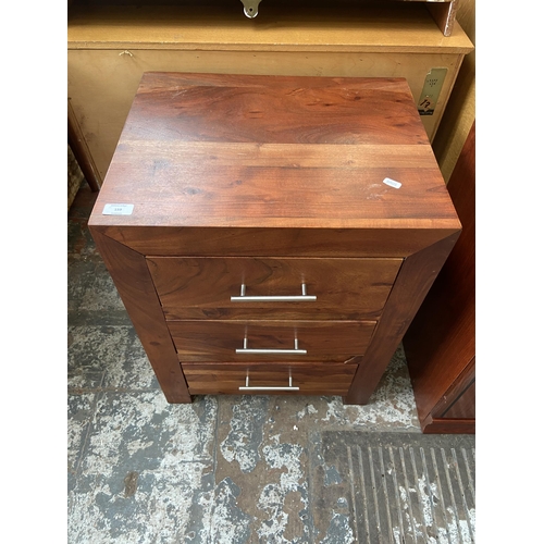 159 - An Indian sheesham wood bedside chest of drawers - approx. 66cm high x 50cm wide x 40cm deep