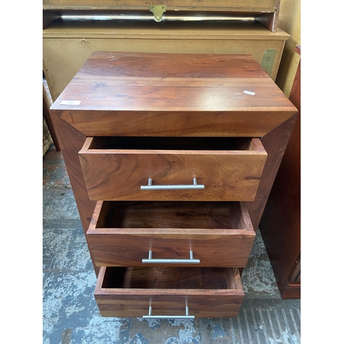 159 - An Indian sheesham wood bedside chest of drawers - approx. 66cm high x 50cm wide x 40cm deep