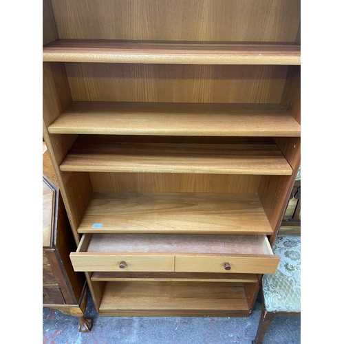 165 - A mid 20th century Nathan teak bookcase - approx. 193cm high x 87cm wide x 27cm deep