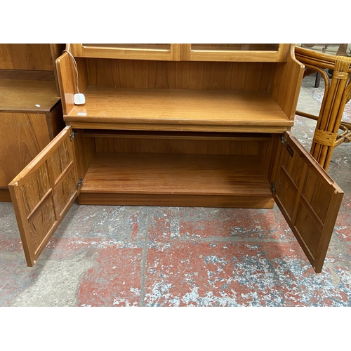 173 - A mid 20th century Nathan teak display cabinet/wall unit - approx. 194cm high x 102cm wide x 46cm de... 