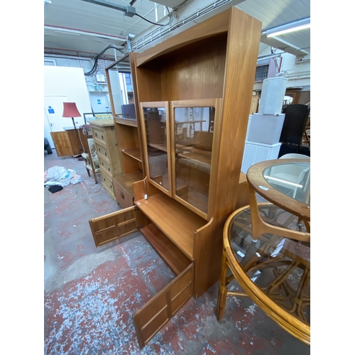 173 - A mid 20th century Nathan teak display cabinet/wall unit - approx. 194cm high x 102cm wide x 46cm de... 