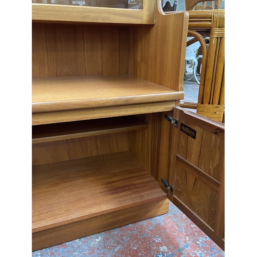 173 - A mid 20th century Nathan teak display cabinet/wall unit - approx. 194cm high x 102cm wide x 46cm de... 