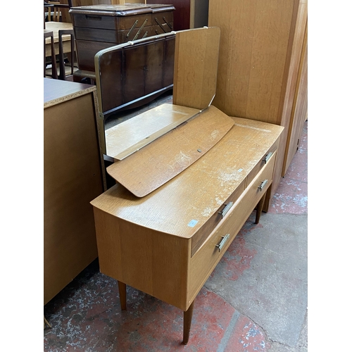 177 - A mid 20th century oak dressing table - approx. 111cm high x 115cm wide x 41cm deep