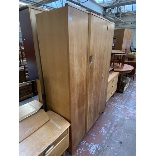 178 - A mid 20th century oak single wardrobe - approx. 179cm high x 118cm wide x 46cm deep