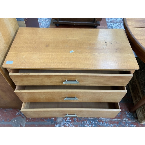 179 - A mid 20th century oak chest of drawers - approx. 70cm high x 81cm wide x 40cm deep