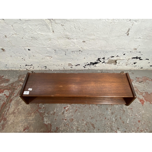 180 - A mid 20th century Aksel Kjersgaard Odder of Denmark No. 22 teak wall shelf - approx. 15cm high x 76... 