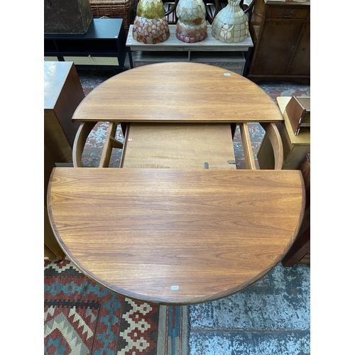 182 - A mid 20th century G Plan Fresco teak circular extending dining table - approx. 73cm high x 123cm di... 