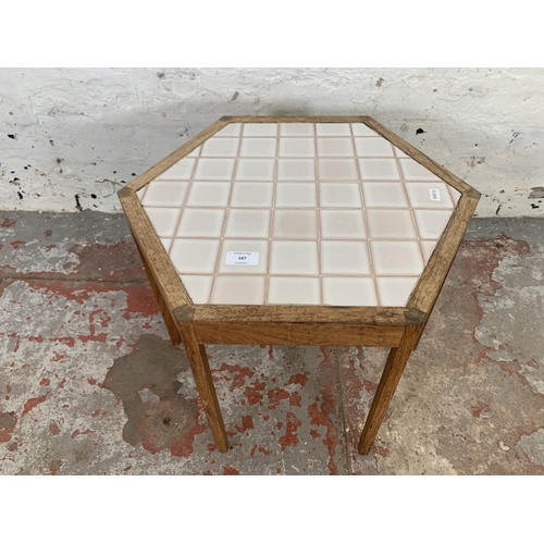 187 - A mid 20th century Hans Andersen for Artex, Denmark teak hexagonal side table with ceramic tile inse... 