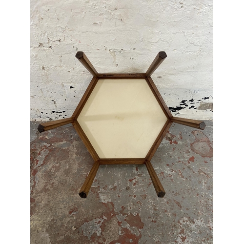 187 - A mid 20th century Hans Andersen for Artex, Denmark teak hexagonal side table with ceramic tile inse... 