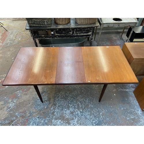 188 - A mid 20th century G Plan teak extending dining table - approx. 72cm high x 91cm wide x 198cm long