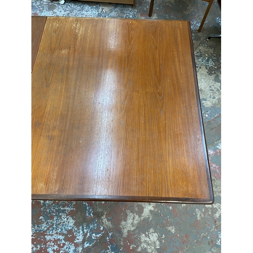 188 - A mid 20th century G Plan teak extending dining table - approx. 72cm high x 91cm wide x 198cm long