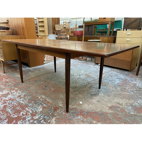 188 - A mid 20th century G Plan teak extending dining table - approx. 72cm high x 91cm wide x 198cm long