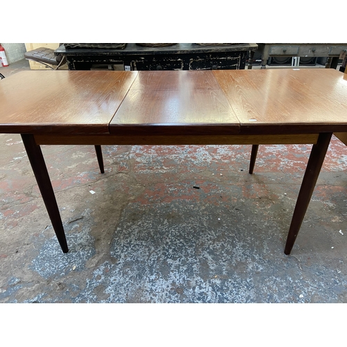 188 - A mid 20th century G Plan teak extending dining table - approx. 72cm high x 91cm wide x 198cm long