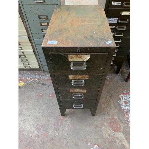 204 - A Stor military green metal four drawer office filing cabinet - approx. 73cm high x 29cm wide x 42cm... 