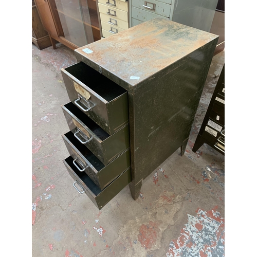 204 - A Stor military green metal four drawer office filing cabinet - approx. 73cm high x 29cm wide x 42cm... 