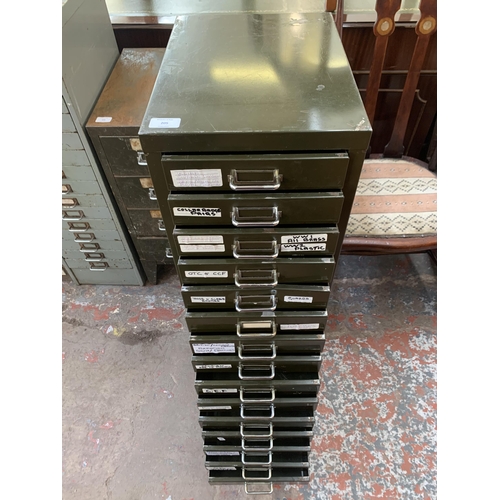 205 - A Stor military green metal fifteen drawer office filing cabinet - approx. 99cm high x 29cm wide x 3... 