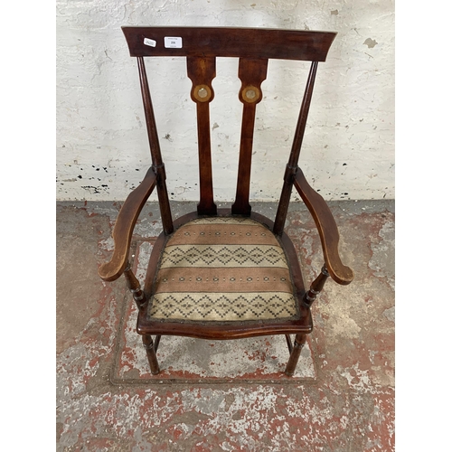 206 - An Arts & Crafts stained beech and mother of pearl inlaid armchair with fabric upholstered seat - ap... 