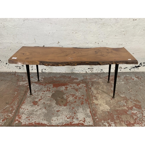 209 - A mid 20th century elm tree slice coffee table on dansette supports - approx. 48cm high x 46cm wide ... 