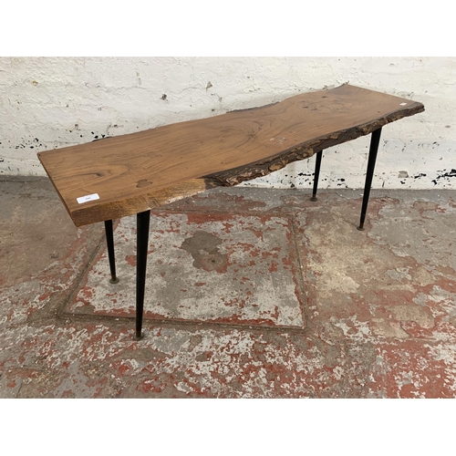 209 - A mid 20th century elm tree slice coffee table on dansette supports - approx. 48cm high x 46cm wide ... 