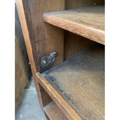 211 - A late Victorian oak shelving unit - approx. 152cm high x 74cm wide x 42cm deep