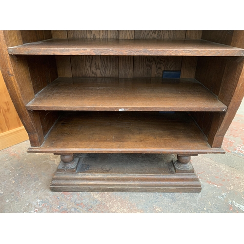 211 - A late Victorian oak shelving unit - approx. 152cm high x 74cm wide x 42cm deep