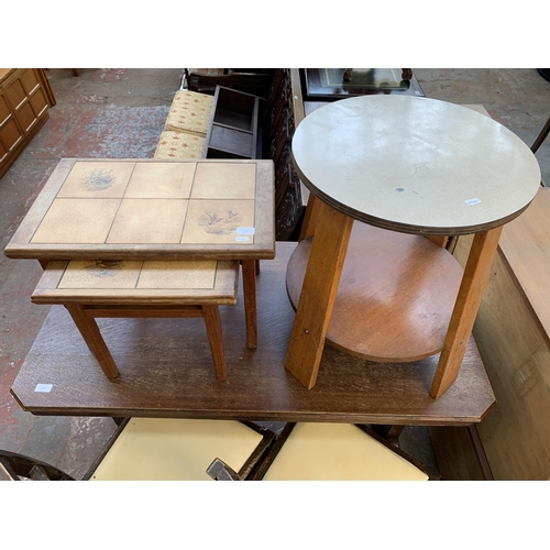 213 - Two pieces of furniture, one teak nest of tables with ceramic tile inserts and one Art Deco style be... 