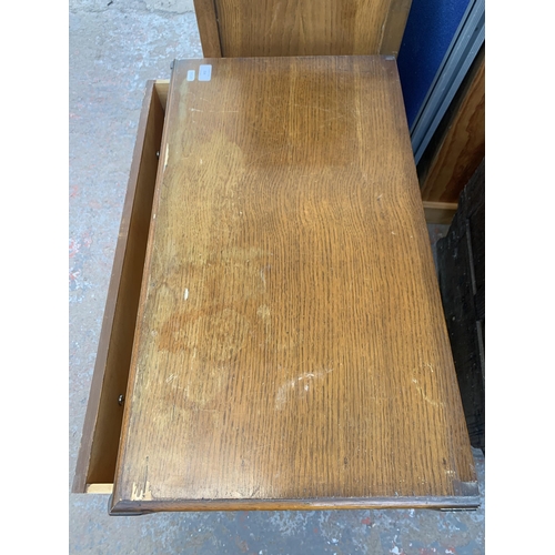 214 - An early/mid 20th century oak chest of drawers - approx. 69cm high x 76cm wide x 42cm deep