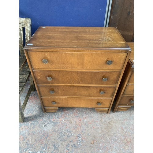 215 - An early/mid 20th century oak chest of drawers - approx. 86cm high x 76cm wide x 42cm deep