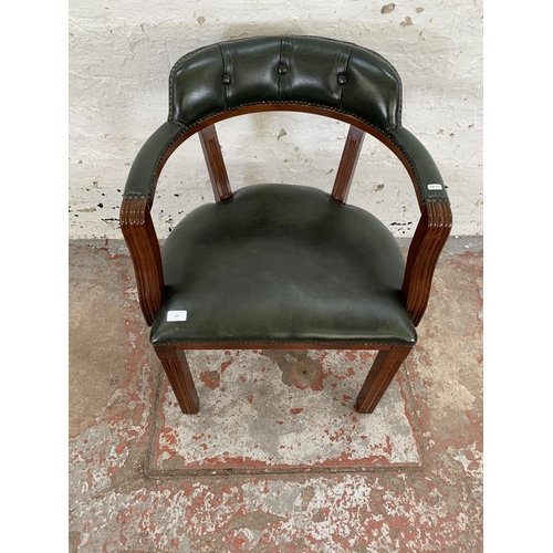 226 - A mahogany and green leather desk chair - approx. 76cm high x 60cm wide x 50cm deep