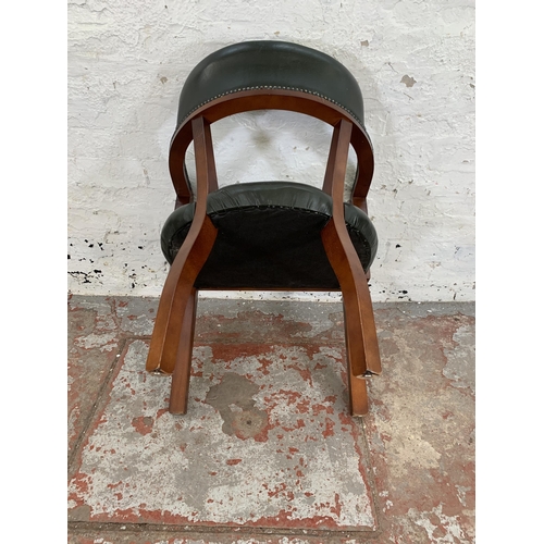 226 - A mahogany and green leather desk chair - approx. 76cm high x 60cm wide x 50cm deep