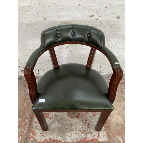 227 - A mahogany and green leather desk chair - approx. 76cm high x 60cm wide x 50cm deep