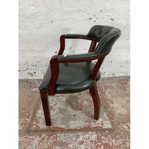 227 - A mahogany and green leather desk chair - approx. 76cm high x 60cm wide x 50cm deep