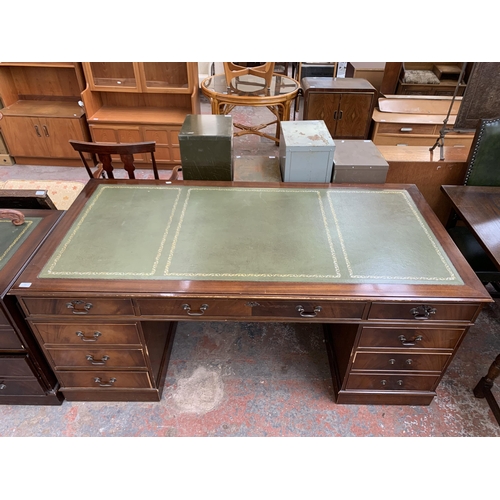 228 - A 19th century style mahogany and green leather pedestal writing desk - approx. 77cm high x 183cm wi... 