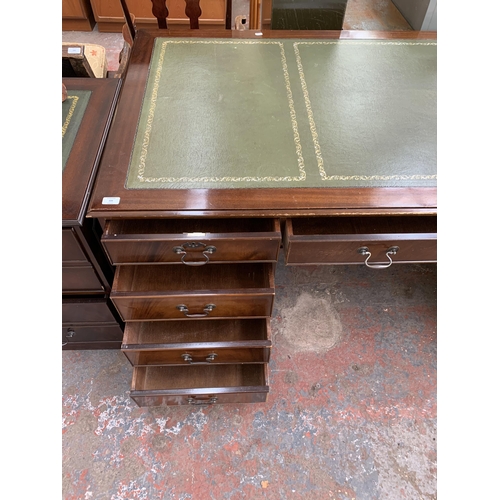 228 - A 19th century style mahogany and green leather pedestal writing desk - approx. 77cm high x 183cm wi... 