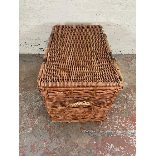 231 - A wicker basket - approx. 55cm high x 89cm wide x 55cm deep