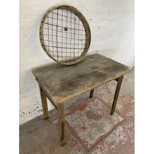 238 - An early 20th century pine farmhouse work table with sieve - approx. 81cm high x 61cm wide x 98cm lo... 