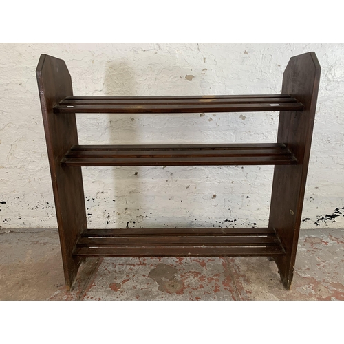 241 - A stained beech three tier shoe rack - approx. 106cm high x 107cm wide x 30cm deep