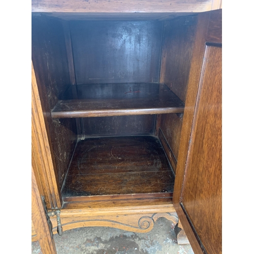 242 - A late 19th/early 20th century Rhind & Sons of Stretford Road Manchester carved oak sideboard - appr... 