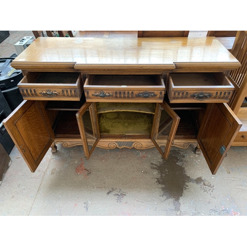 242 - A late 19th/early 20th century Rhind & Sons of Stretford Road Manchester carved oak sideboard - appr... 