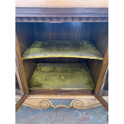 242 - A late 19th/early 20th century Rhind & Sons of Stretford Road Manchester carved oak sideboard - appr... 