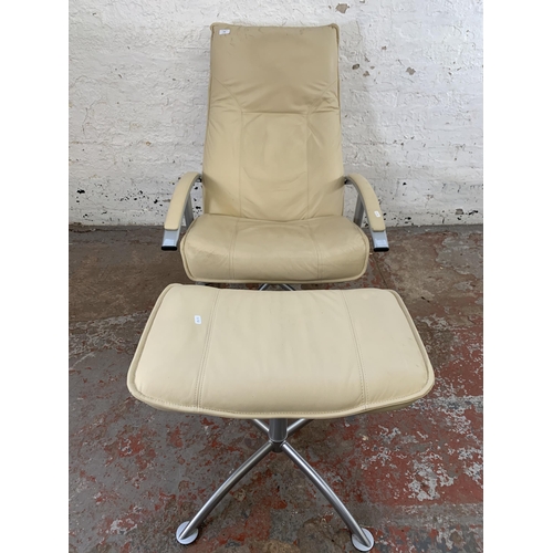 246 - A modern cream leather and grey metal swivel reclining armchair and footstool