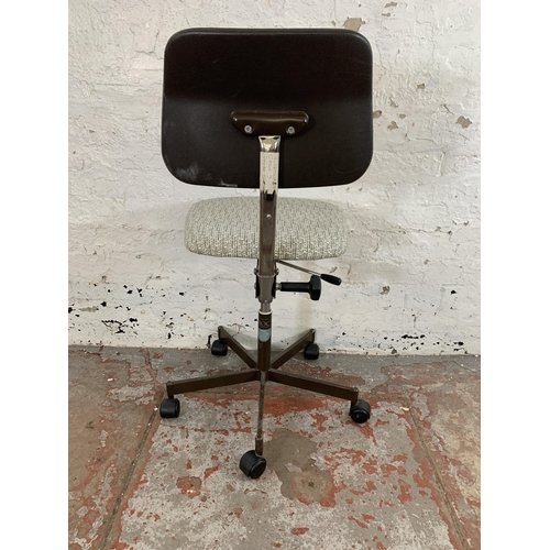 249 - A mid 20th century ROC swivel office desk chair