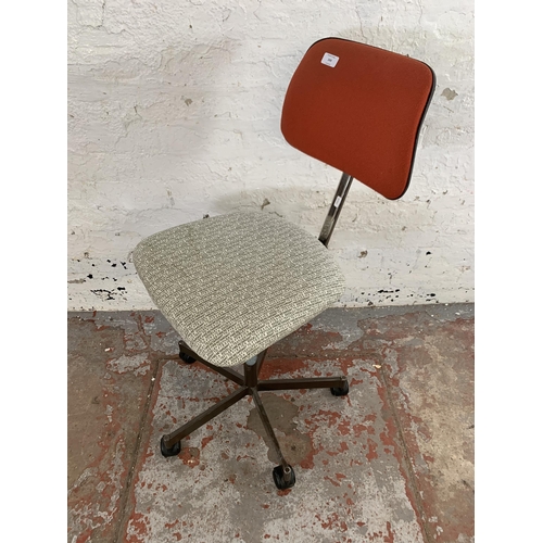 249 - A mid 20th century ROC swivel office desk chair