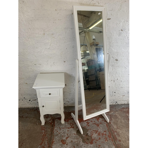 27 - Two pieces of white painted furniture, one French style bedside cabinet and one cheval mirror - appr... 