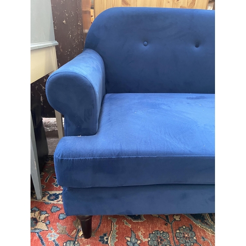 44 - A Victorian style blue fabric upholstered two seater sofa - approx. 87cm high x 123cm wide x 79cm de... 