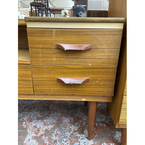 61 - A mid 20th century teak effect dressing table - approx. 106cm high x 120cm wide x 43cm deep