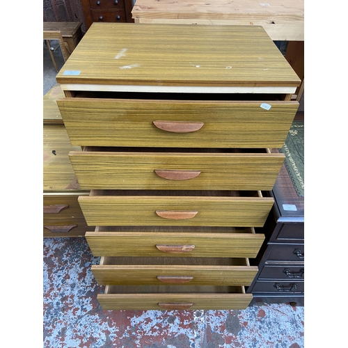 62 - A mid 20th century teak effect chest of drawers - approx. 110cm high x 59cm wide x 42cm deep