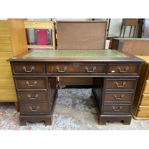 64 - A 19th century style mahogany and green leather pedestal writing desk - approx. 75cm high x 122cm x ... 