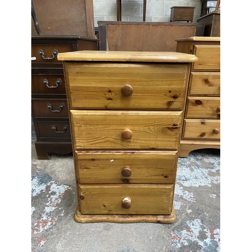 65 - A modern pine bedside chest of drawers - approx. 68cm high x 43cm wide x 38cm deep